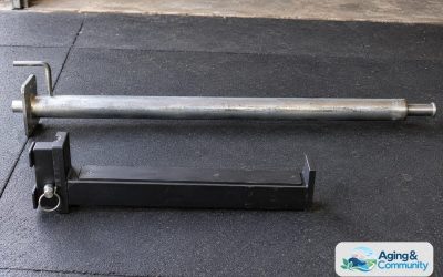 Safety Bars vs Spotter Arms: Home Gym Safety Guide